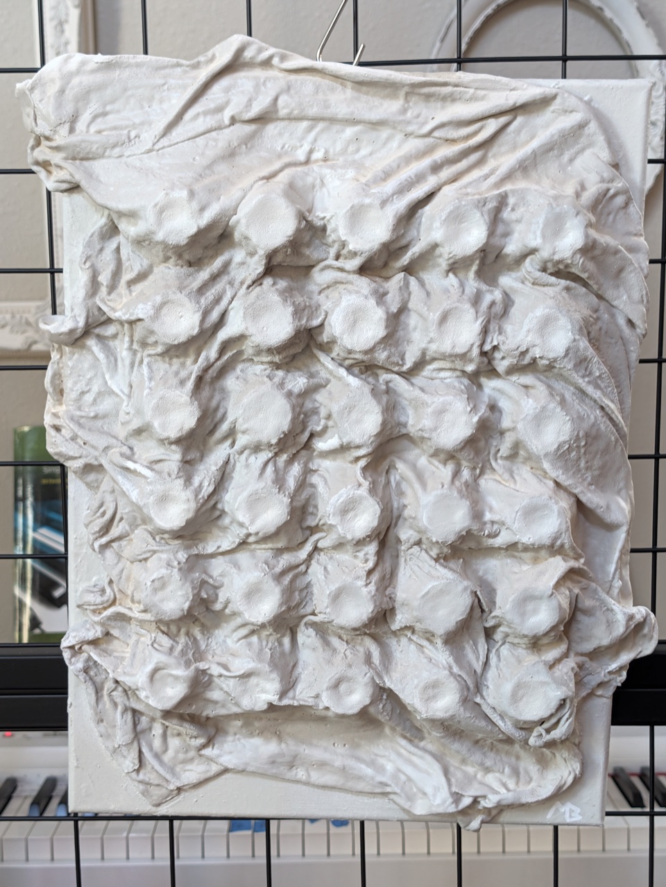 Plaster relief by Mark